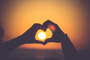 Sun with Hands making a Heart