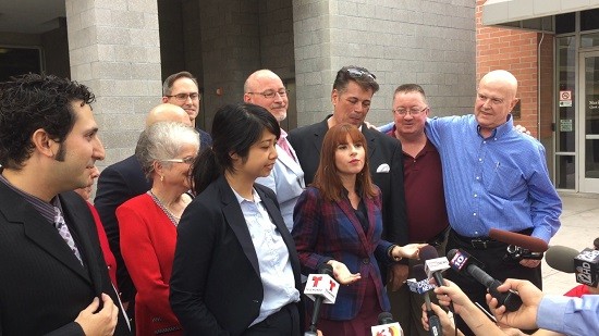 (Left to right) Jeremy Zegas, project director for Why Marriage Matters Arizona; Carmina Ocampo of Lambda League; and Heather Macre of Aiken Schenk (another law firm assisting with the Arizona federal case. At the right are Joseph Connolly (red shirt), and Terry Pochert, (blue shirt).