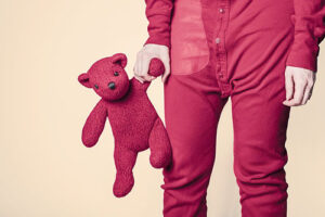 Child Holding Teddy Bear